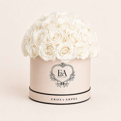 Blanc Éternel arrangement of 43 preserved ivory roses in Eros & Arpel cream-white hatbox