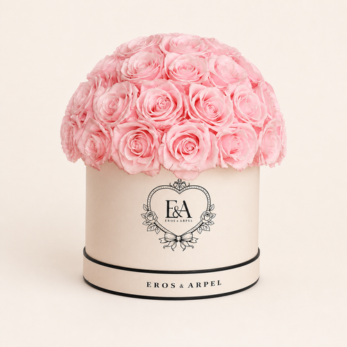 Blush Éternel arrangement of 43 preserved blush roses in Eros & Arpel cream-white hatbox