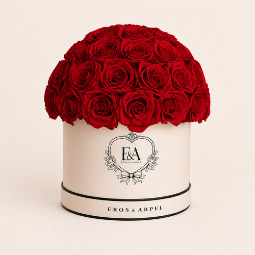 Rouge Éternel arrangement of 43 preserved red roses in Eros & Arpel cream-white hatbox